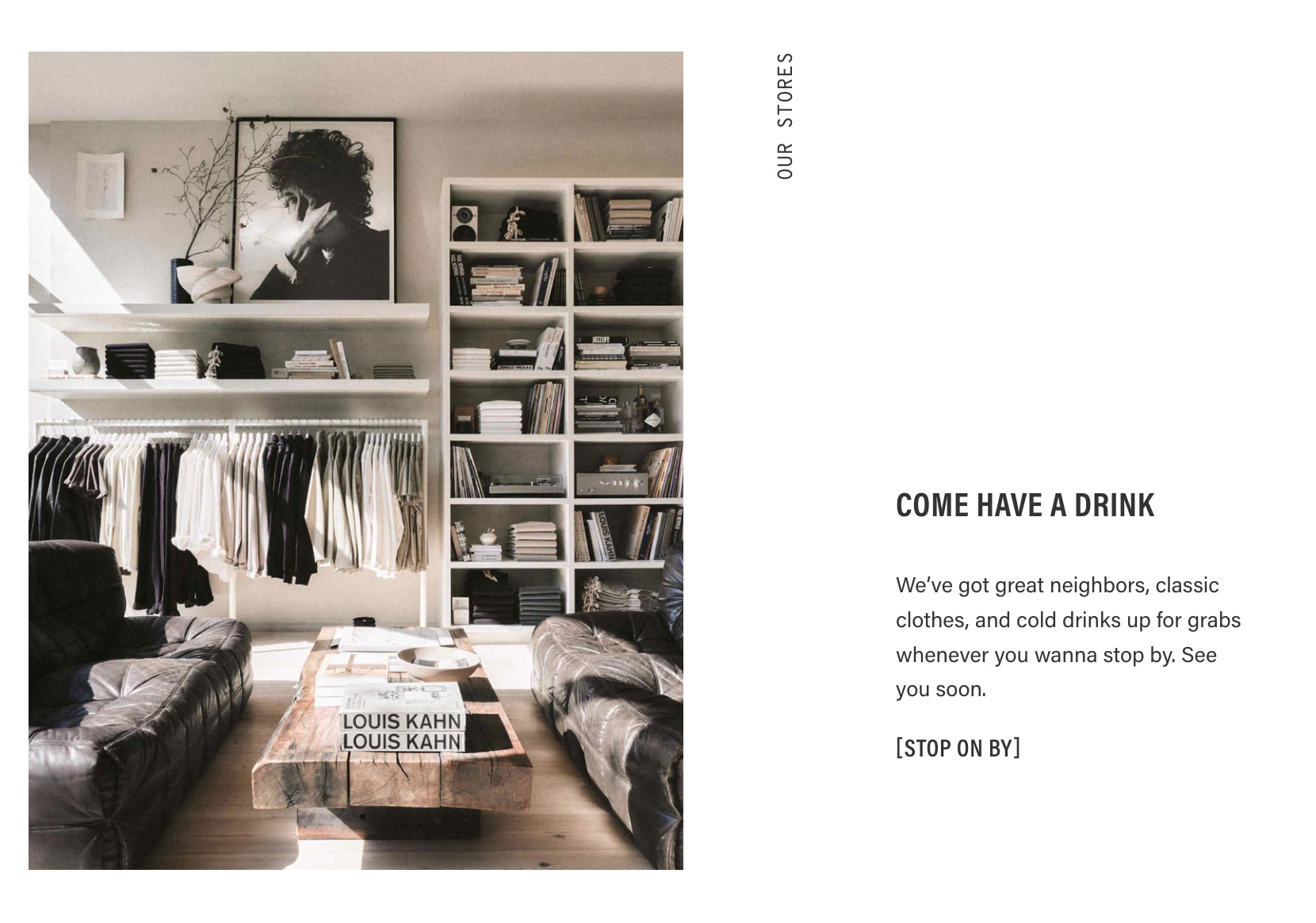 Screenshot of Buck Mason About Us page showing their bright and calm showroom full of leather couches art