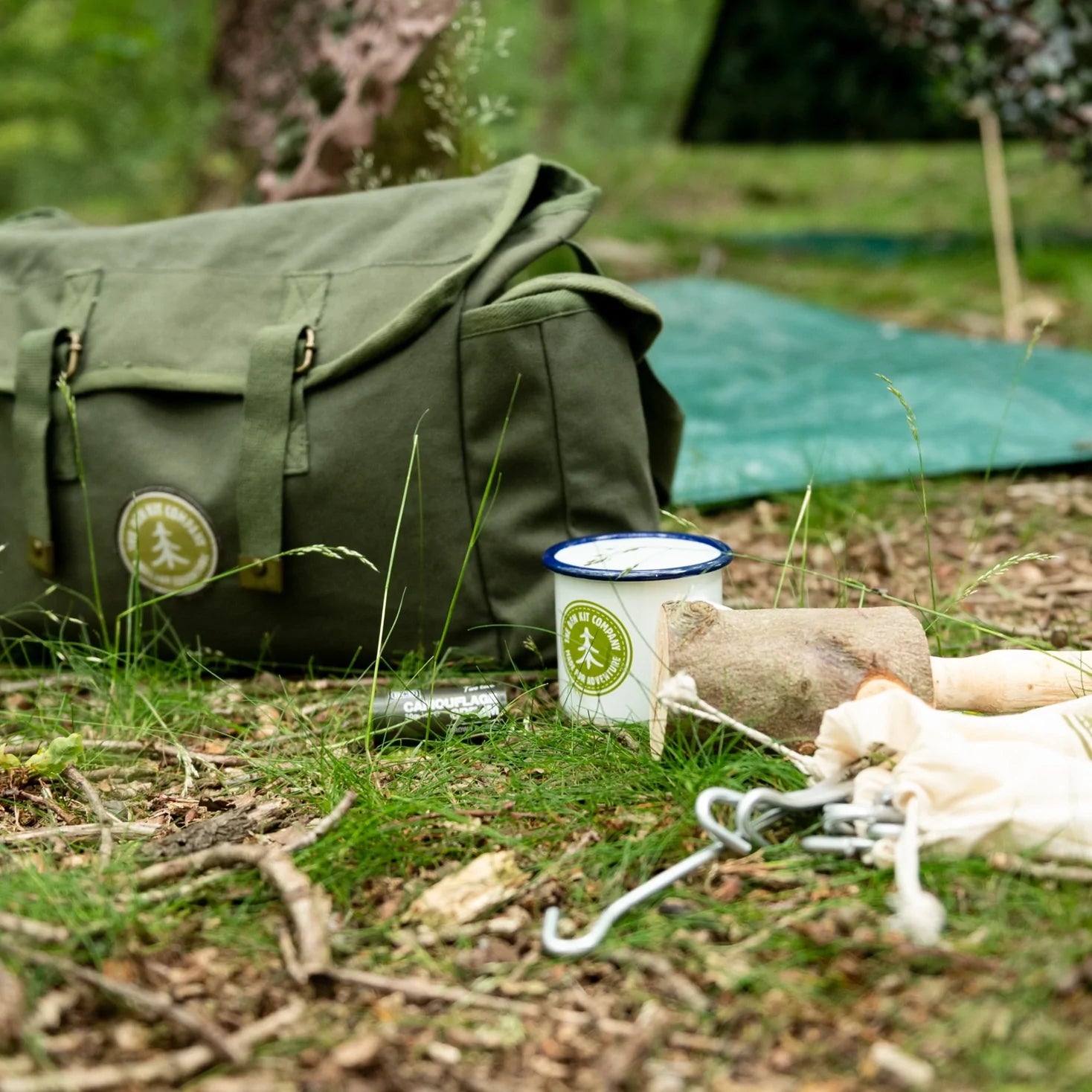 Outdoor camping scene featuring a canvas discovery pack for children