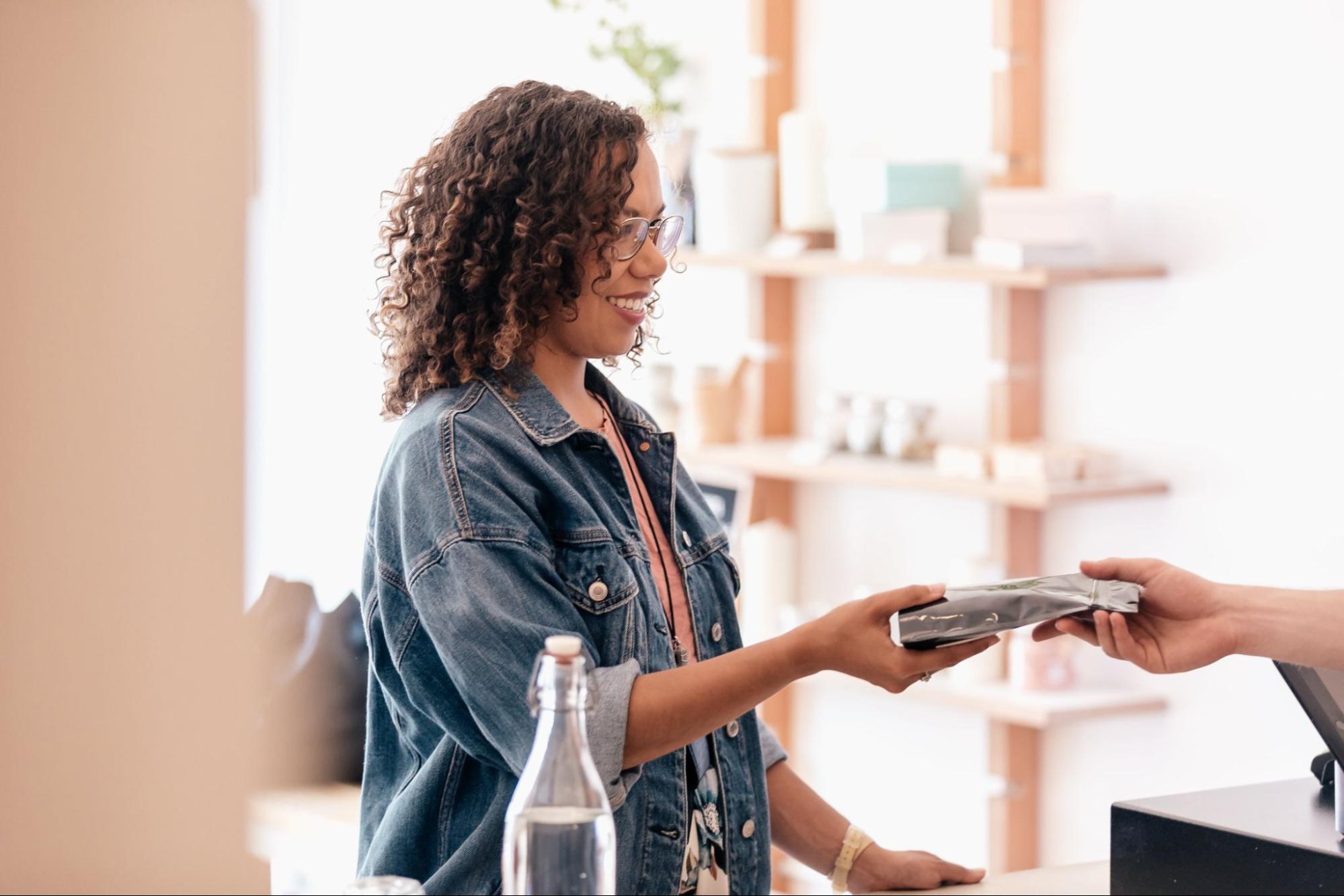 Employee helping customer